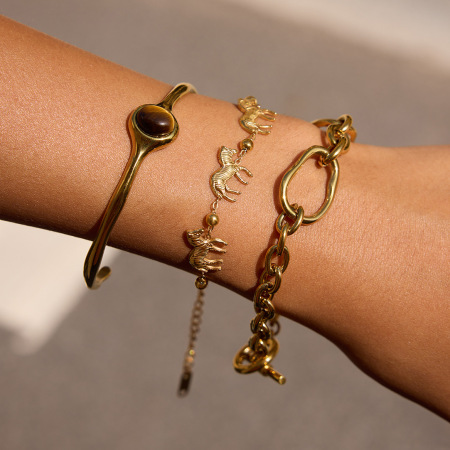 Bracelet à breloques pour femme, 1 pièce, luxueux, en acier inoxydable, étanche, couleur or, motif zèbre.