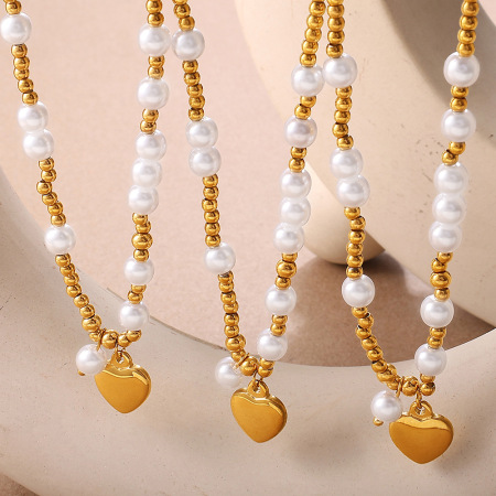 Collier en acier inoxydable doré, imperméable, avec perles et cœur (1 pièce).