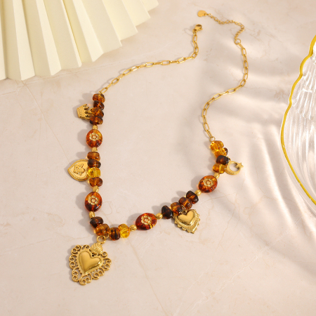 Collier pendentif femme étanche en acier inoxydable, orné de perles irrégulières en forme de cœur, d'étoile et de lune.