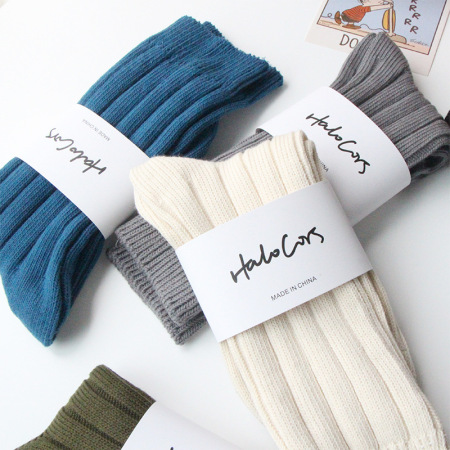1 paire de chaussettes mi-mollet en coton côtelé doux, couleur unie