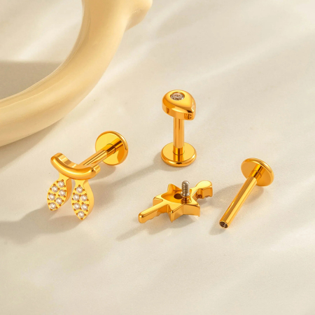 Boucles d'oreilles piercing femme en titane doré avec zircon et nœud papillon en forme d'étoile (1 pièce). 2