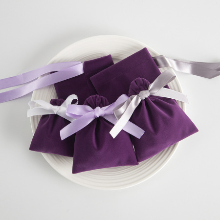 Pochette à bijoux en flanelle unie avec nœud papillon et cordon de serrage (1 pièce)