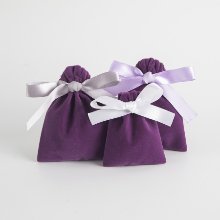 Pochette à bijoux en flanelle unie avec nœud papillon et cordon de serrage (1 pièce) 2