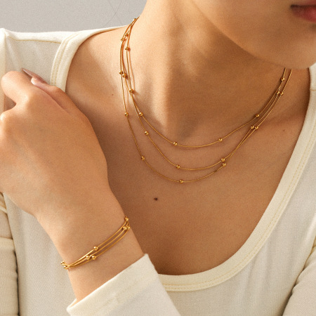 Ensemble de colliers à plusieurs rangs en acier inoxydable imperméable couleur or