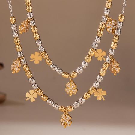 Ensembles de bijoux délicats pour femmes en acier titane et zircon, mêlant or et argent.