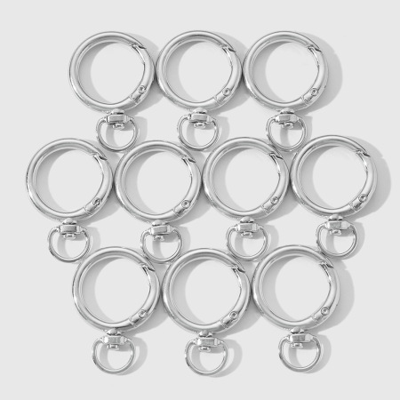 1 lot de breloques rondes simples en alliage argenté pour sac à main femme