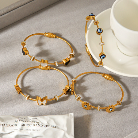 Bracelet jonc étanche en acier inoxydable doré avec œil du diable et papillon (1 pièce) 2
