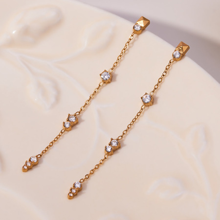 1 paire de boucles d'oreilles pendantes pour femme, en acier inoxydable doré, imperméables, ornées de zircon et de pompons exquis. 2
