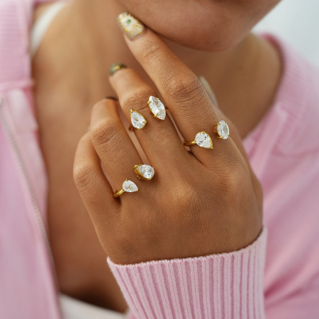 Bague de luxe pour femme, en acier inoxydable doré, avec motif goutte d'eau.