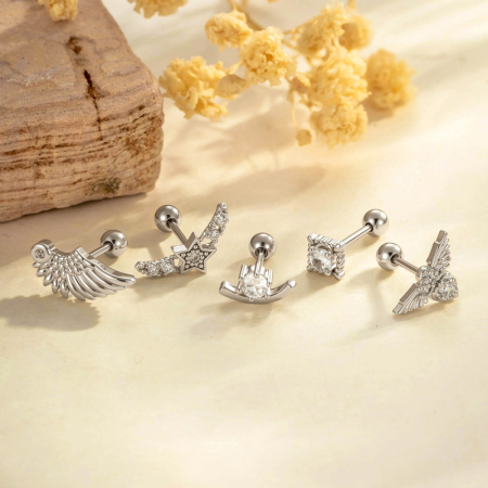 Boucles d'oreilles pendantes délicates en forme d'ailes d'étoile, couleur cuivre doré, avec zircon. 2