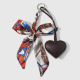 Un porte-clés en forme de cœur marron foncé Image7