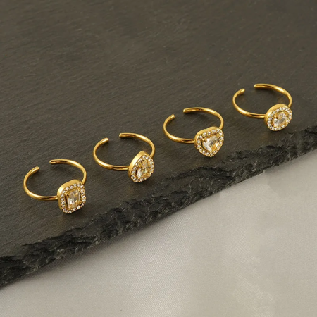 Bague pour femme en acier inoxydable doré, ornée d'un zircon et d'un pendentif goutte d'eau brillant. 2