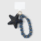 Un porte-clés étoile à motif léopard bleu foncé Image4