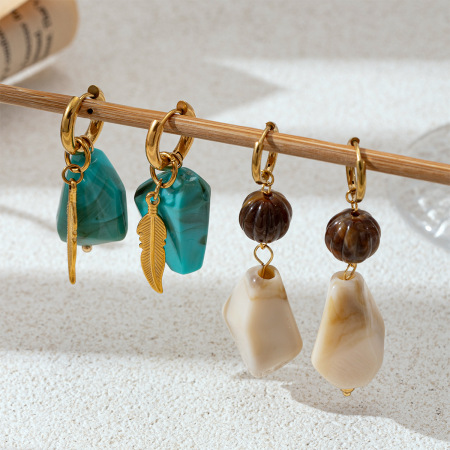 Boucles d'oreilles pendantes pour femme, style ethnique, en acier inoxydable doré, imperméables, ornées de perles en forme d'ailes (1 paire).