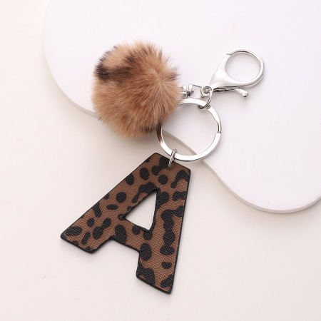 Porte-clés élégant en PU de qualité, imprimé léopard, avec lettre (1 pièce)