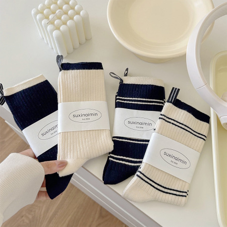 Chaussettes mi-mollet en coton à rayures, décontractées et polyvalentes, pour le sport et le rebond.
