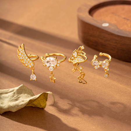 Boucles d'oreilles à clip pour femme, délicates boucles d'oreilles papillon couleur cuivre doré avec zircon.
