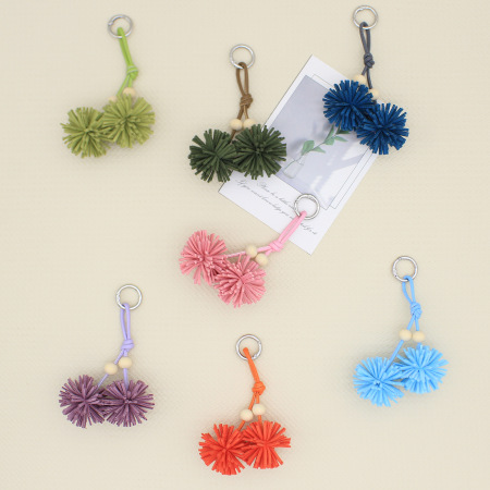 Breloques de sac pour femme en PU de qualité supérieure avec pompons et fleurs classiques 2