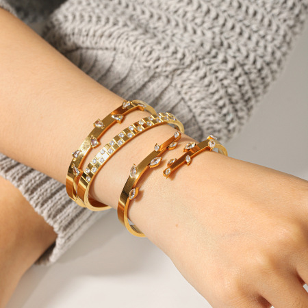 Bracelet en acier inoxydable étanche en forme de feuille, couleur or, avec zircon.