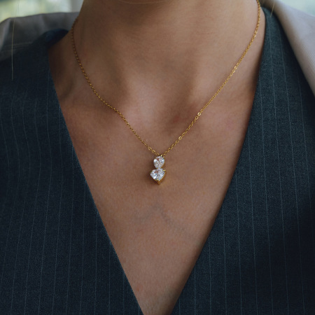Colliers pendentifs pour femmes en acier inoxydable, couleur or, ornés de zircon en forme de goutte et de cœur, aux détails raffinés 2