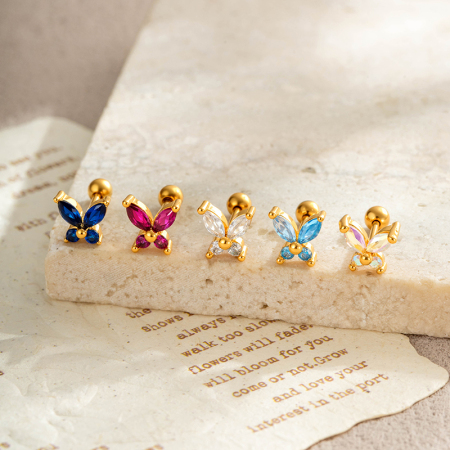 Boucles d'oreilles papillon exquises en cuivre doré et zircon pour femmes, ornées de piercings.