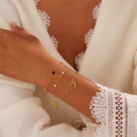 Bracelet en acier inoxydable étanche avec maillons ajourés en forme de cœur et plaqué or 18 carats