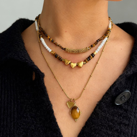 Collier en acier inoxydable étanche, couleur or, orné de perles en forme de cœur, de cristal et de pierre naturelle.