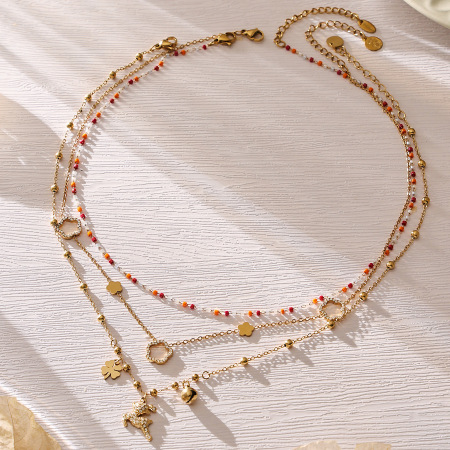 Collier pendentif femme en acier inoxydable doré, léger, imperméable et anti-ternissement, avec chaîne à fleurs simple