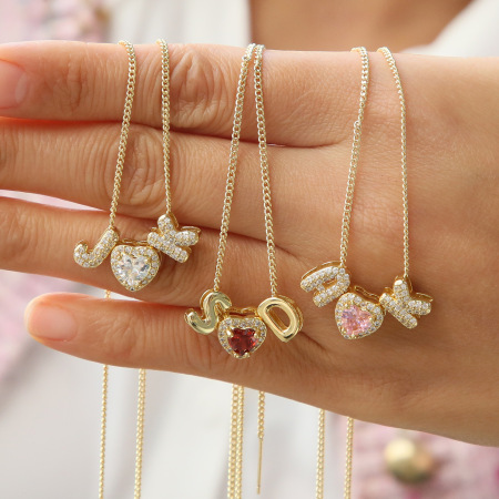 Pendentifs pour femmes en cuivre à motif cœur rayonnant