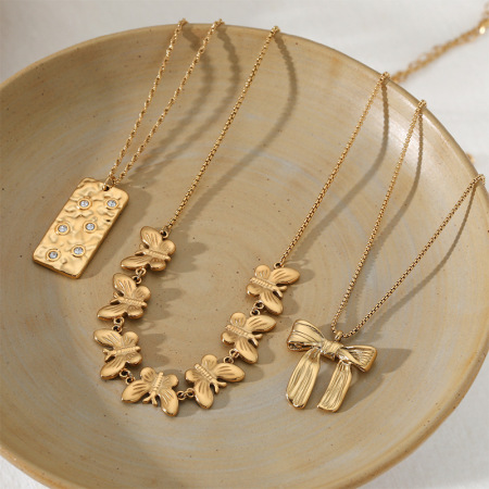 Colliers pendentifs pour femmes en acier inoxydable, couleur or, avec nœud papillon 2