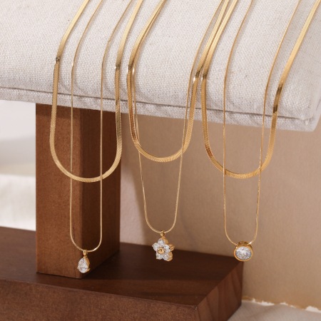 Colliers superposés pour femmes, en acier inoxydable étanche, ornés de zircon et de motifs floraux classiques en goutte d'eau