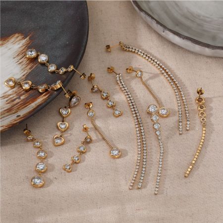 Boucles d'oreilles pendantes pour femme, style luxueux, en acier inoxydable, imperméables, couleur or, avec pompon et zircon.