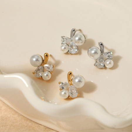 Boucles d'oreilles puces pour femme, style romantique et élégant, en acier inoxydable, étanches, couleur or, avec zircon.