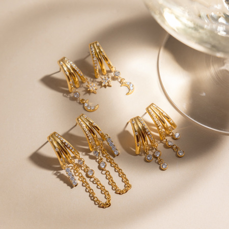 Boucles d'oreilles pendantes pour femmes, en acier inoxydable doré avec zircon, ornées d'un soleil et d'une lune éclatants, étanches et anti-ternissement.