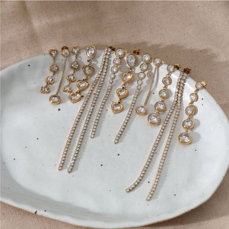 Boucles d'oreilles pendantes pour femme, style luxueux, en acier inoxydable, imperméables, couleur or, avec pompon et zircon. 2