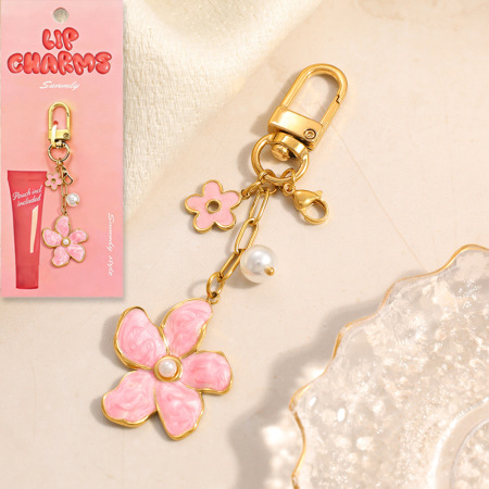 Porte-clés en acier inoxydable doré avec nœud papillon et fleur émaillée, motif cerise.