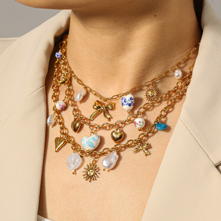 Colliers pendentifs pour femmes en acier inoxydable étanche, couleur or, avec nœud papillon et cœur