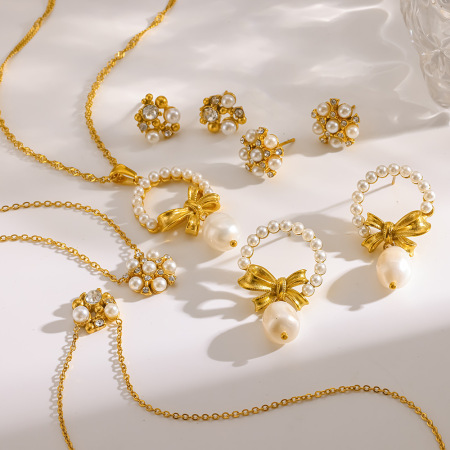 Ensembles de bijoux pour femmes luxueux et élégants, ornés d'un nœud papillon, en acier inoxydable imperméable, couleur or, zircon et perles artificielles. 2