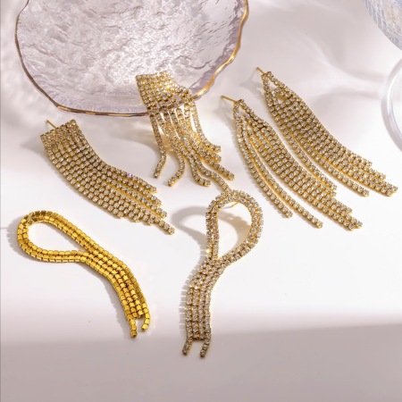 Boucles d'oreilles pendantes pour femme, luxueuses et élégantes, en acier inoxydable étanche couleur or et strass, ornées de pompons.