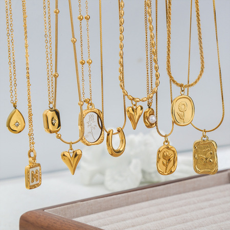 Colliers pendentifs élégants pour femmes, en acier inoxydable doré, en forme de cœur rectangulaire et de fleur en goutte d'eau