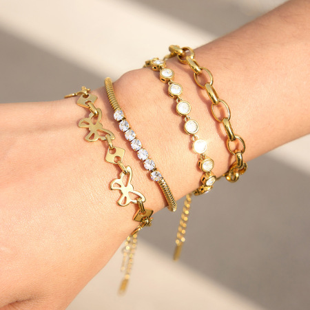 Bracelet à maillons luxueux et simples en acier inoxydable, orné d'un papillon, de zircon doré et d'une étanchéité.