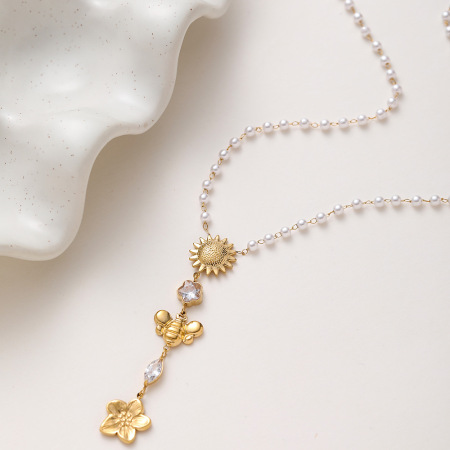 Colliers pendentifs pour femmes, luxueux, de style bohème, ornés de fleurs, en acier inoxydable, imperméables, avec zircon et perles artificielles.