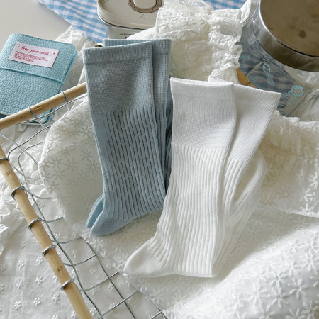 Chaussettes mi-mollet élégantes en coton uni à rebond élevé