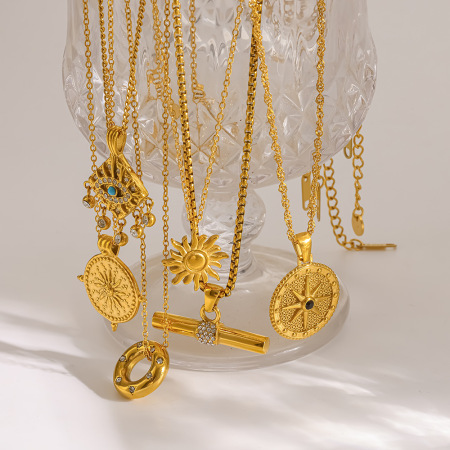 Colliers pendentifs pour femmes luxueux, style rétro, en forme d'œil de diable et de soleil, en acier inoxydable étanche couleur or et zircon.