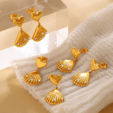 Boucles d'oreilles pendantes pour femme en acier inoxydable doré, imperméables, en forme de cœur et ornées de strass.