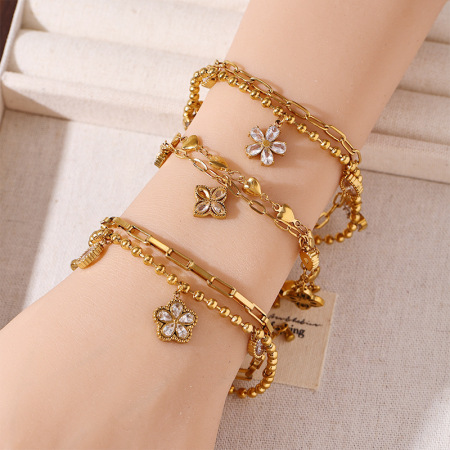 Bracelet à breloques pour femme en acier inoxydable, orné de fleurs, de cœurs et de papillons, étanche, avec zircon doré 2