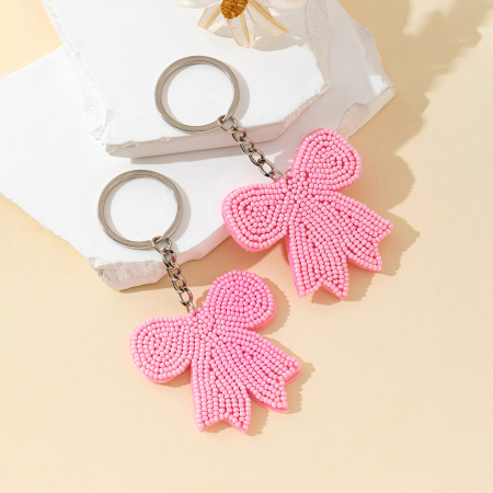 Porte-clés perles nœud papillon doux, série simple