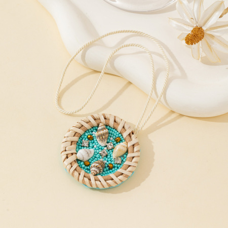 Collection luxueuse de bijoux de sac pour femme, style vacances océanique, perles, fil tressé, rotin et strass