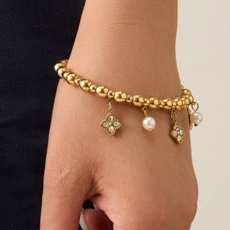 Bracelet manchette élégant en acier inoxydable, étanche, couleur or, orné de zircon et serti de fleurs. 2