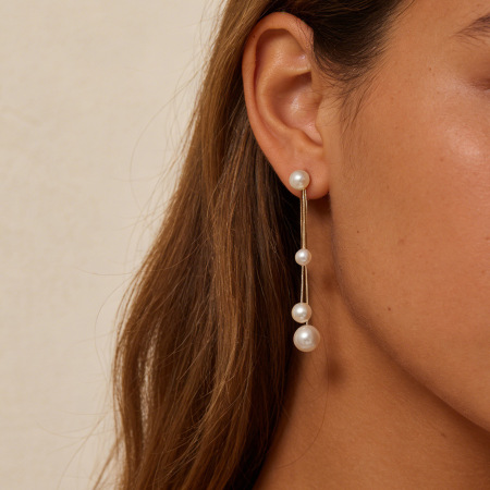 Boucles d'oreilles pendantes élégantes pour femmes, en acier inoxydable imperméable, couleur or, avec pompon et perles.